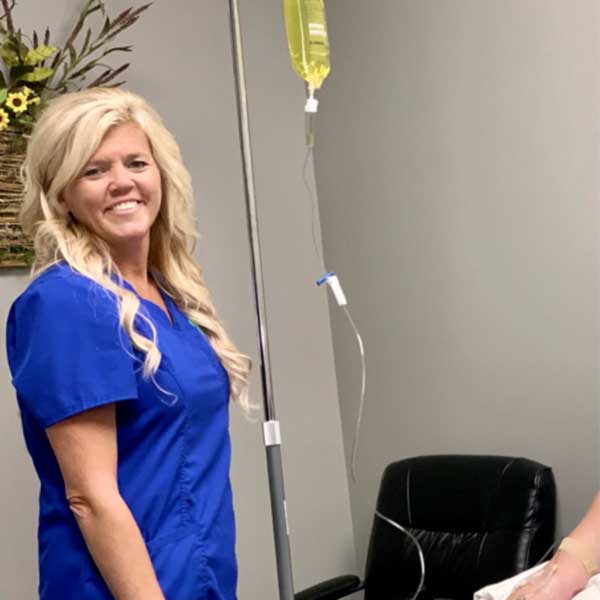 Dawn Barrom in an IV hydration therapy treatment.
